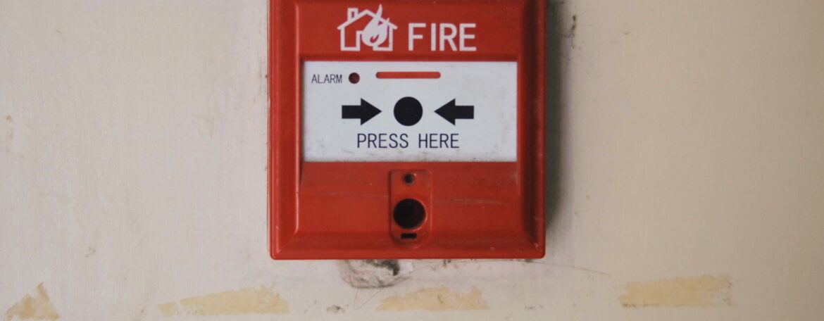 fire alarm attached to wall