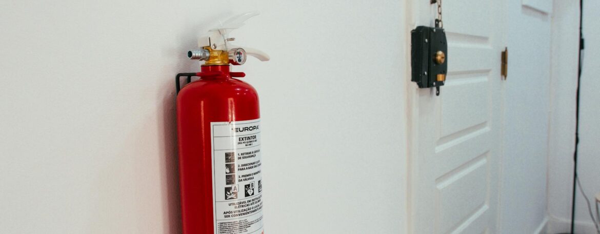 Image of Fire Extinguisher attached to a wall
